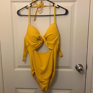 Selling a cute one piece swim suit. Never worn